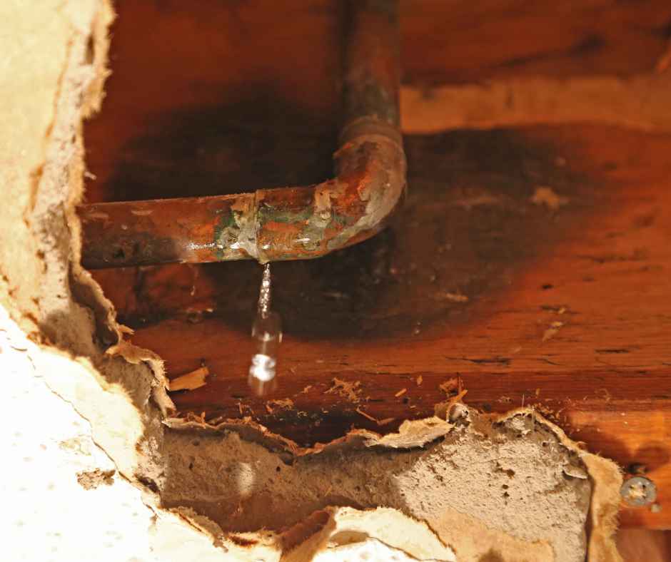 Water dripping from a pipe in a home